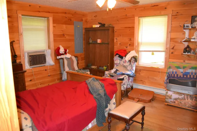 a view of a room with chairs and a table