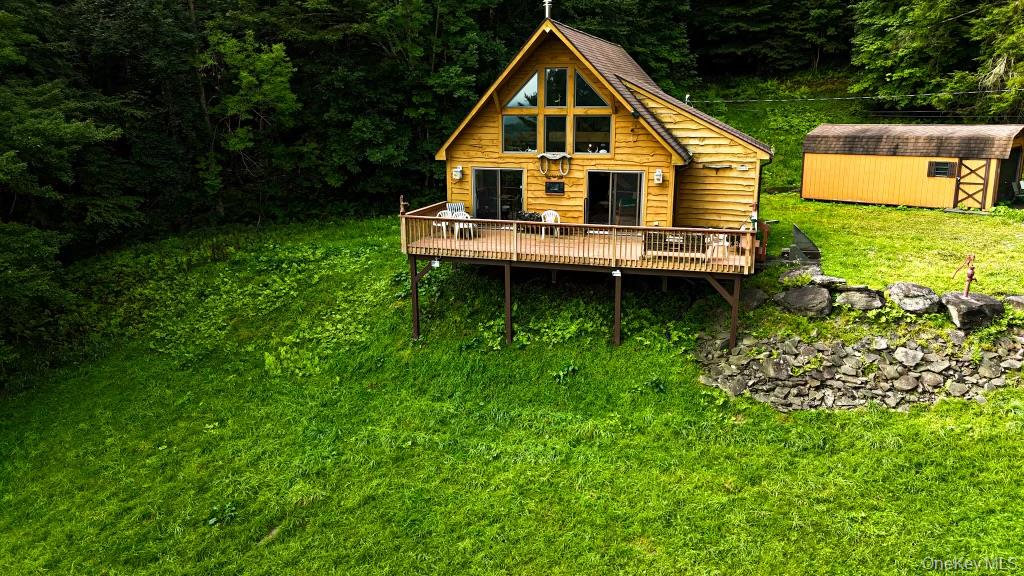 365 Via Appian Way Roscoe, NY 12776 - Photo 2 of 30 a view of a house with a yard
