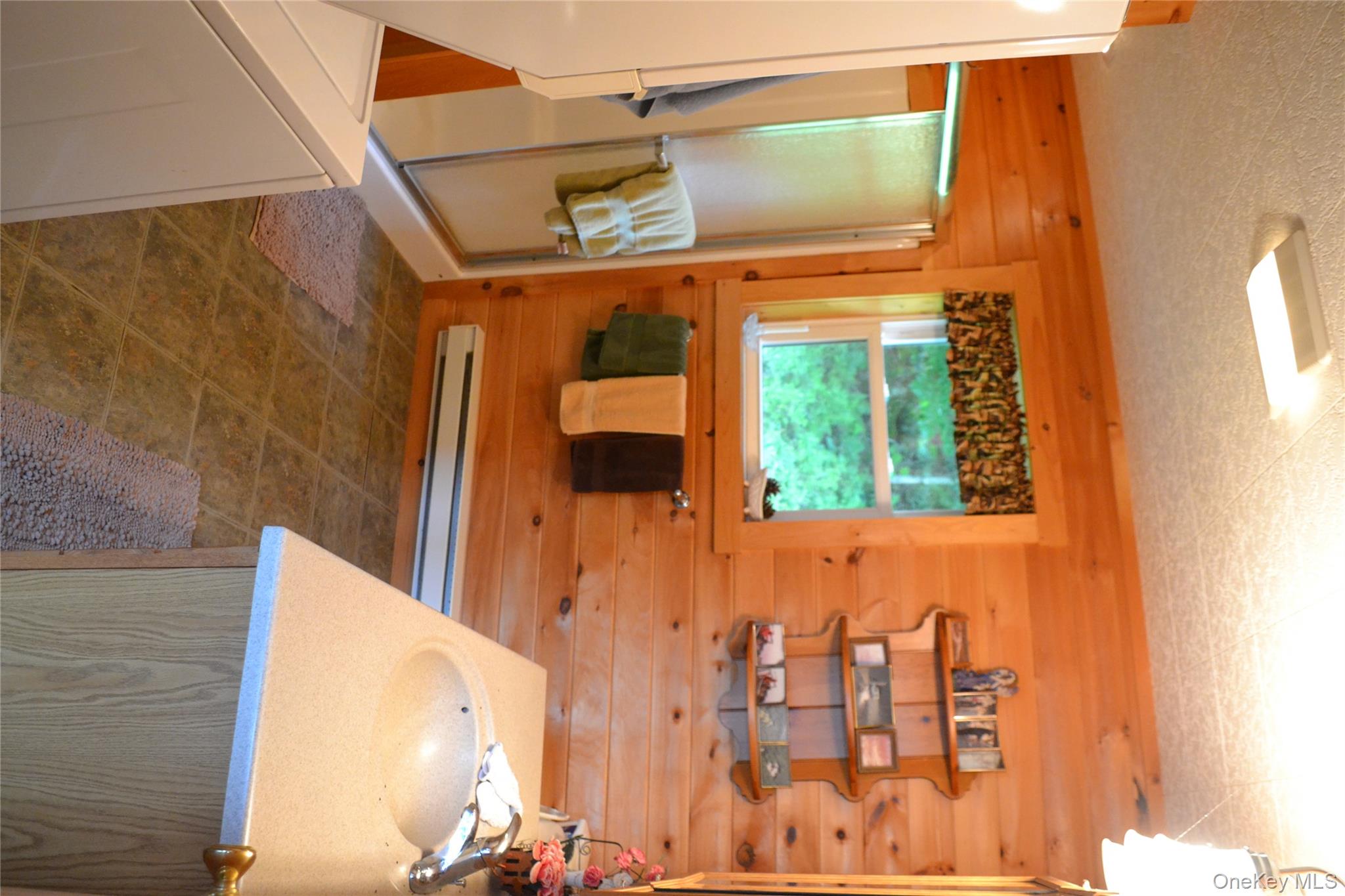 365 Via Appian Way Roscoe, NY 12776 - Photo 24 of 30 a view of a terrace with outdoor seating and ocean view