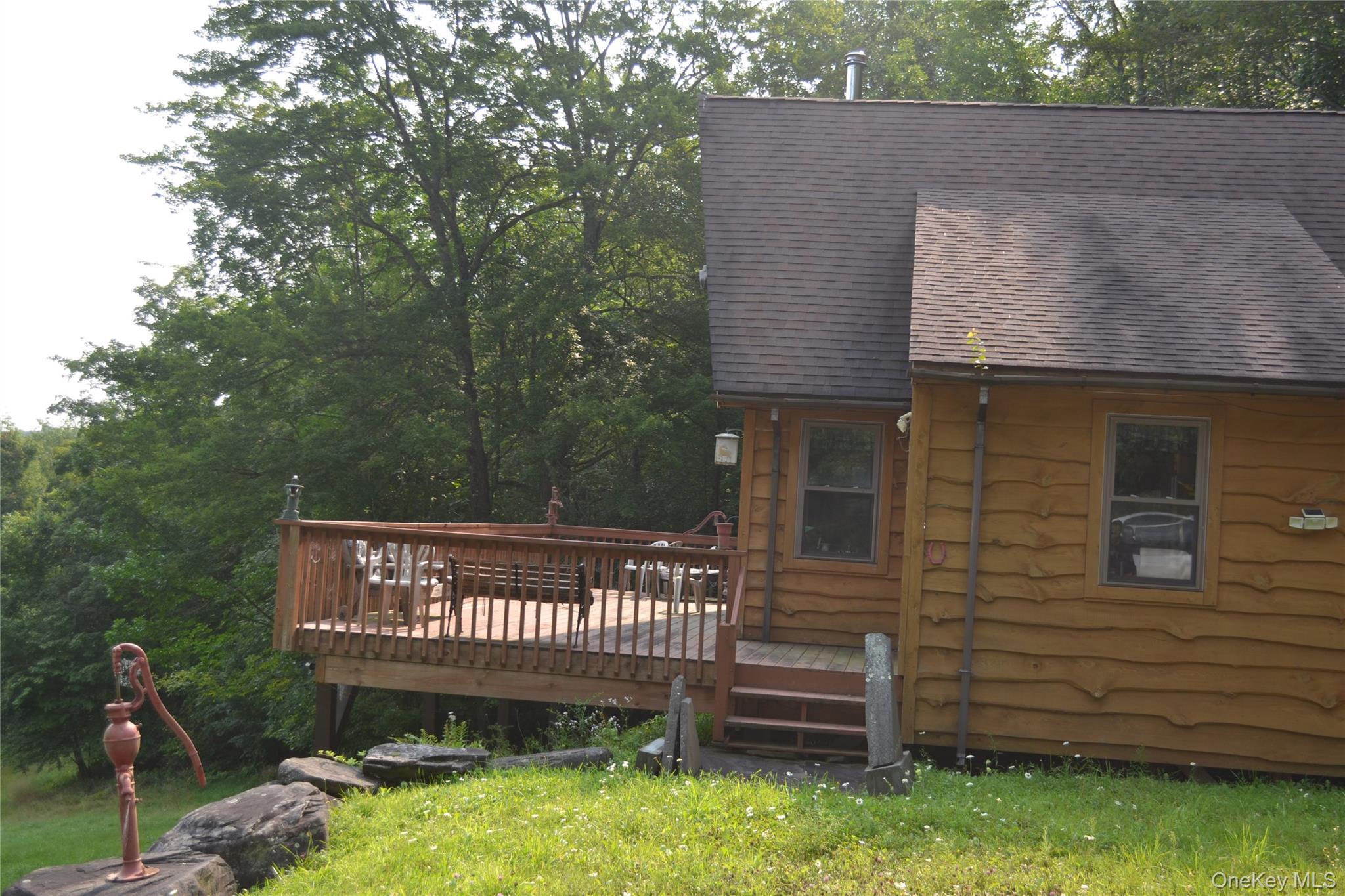 365 Via Appian Way Roscoe, NY 12776 - Photo 27 of 30 a view of a wooden fence next to a yard