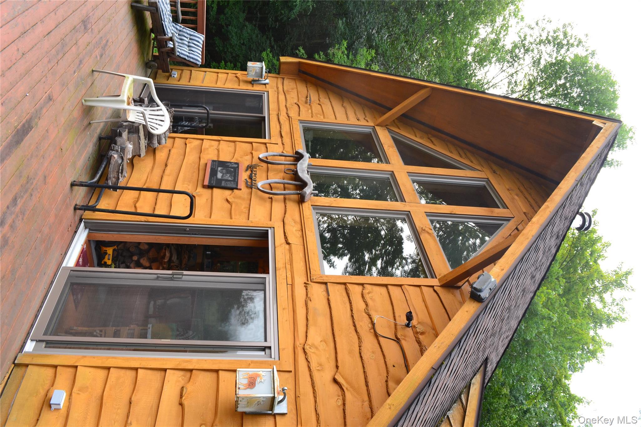 365 Via Appian Way Roscoe, NY 12776 - Photo 3 of 30 a front view of a house with a yard