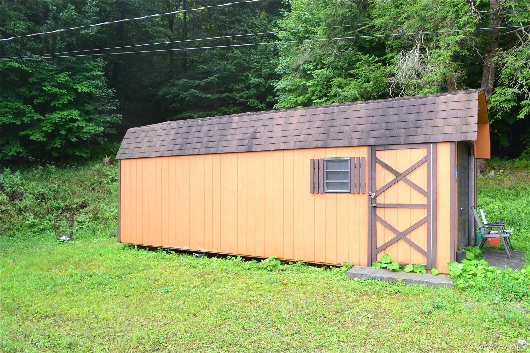 365 Via Appian Way Roscoe, NY 12776 - Photo 8 of 30 a view of a backyard with potted plants