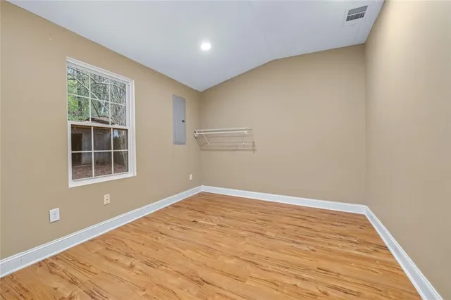 a bathroom with a sink a mirror and a toilet