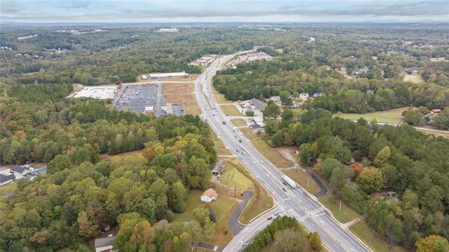 a view of a city with mountains in the background