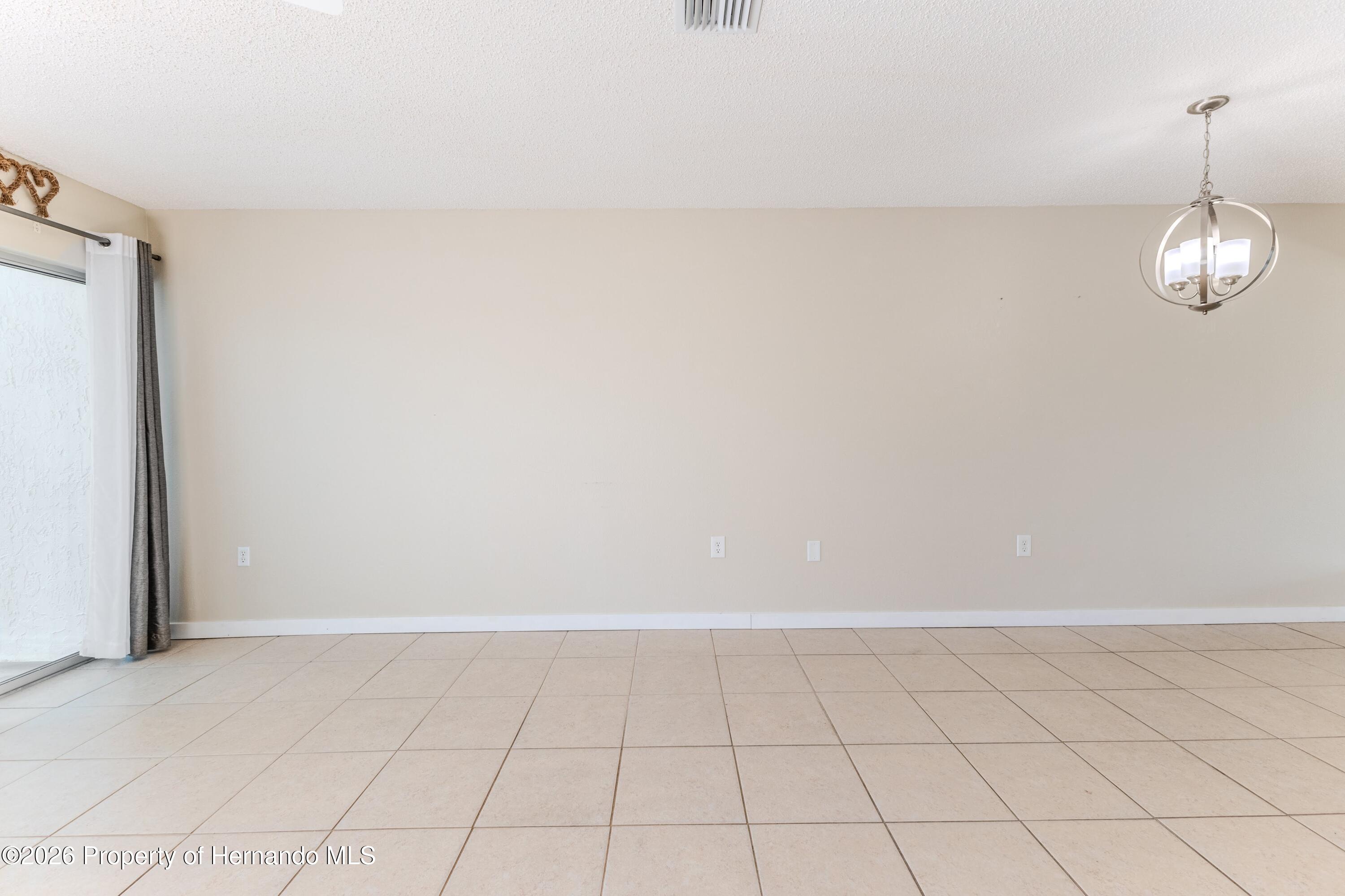 8141 Bugle Court, Unit 1 Port Richey, FL 34668 - Photo 11 of 33 5W1A0557-HDR