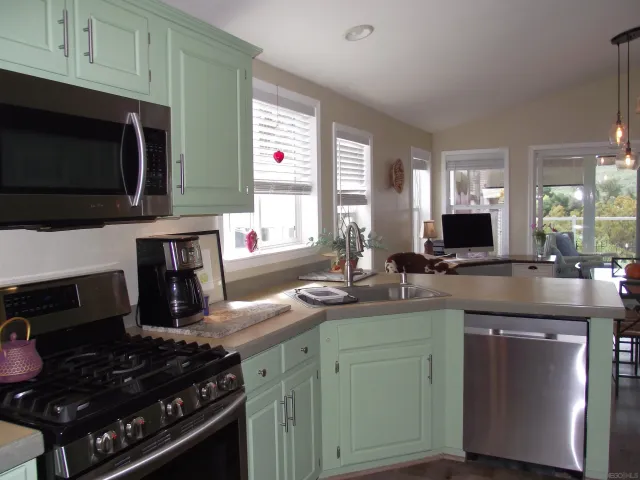 a view of a balcony with wooden floor