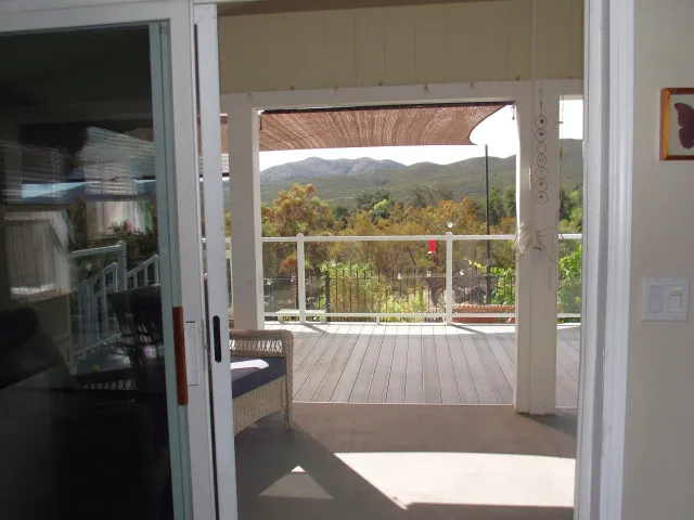 a view of a street with a tree