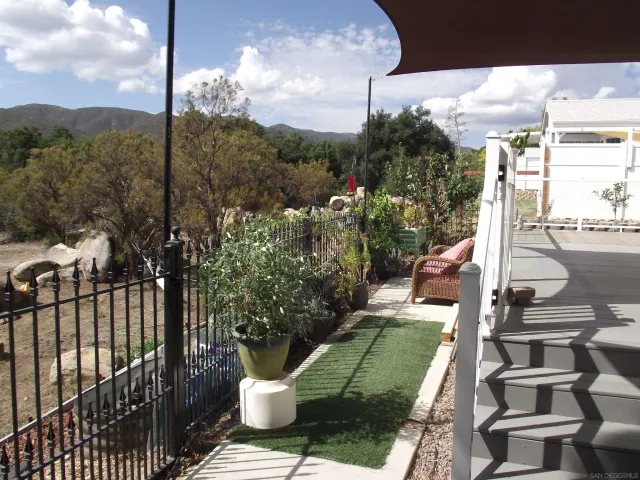 a view of a livingroom with furniture and window