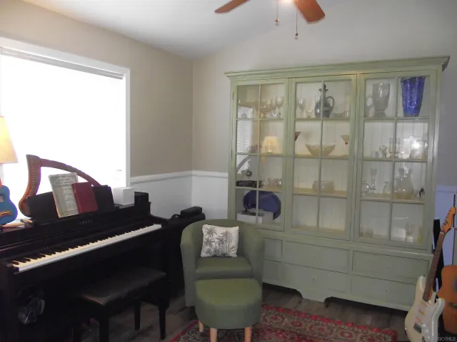 a white bath tub sitting next to a window