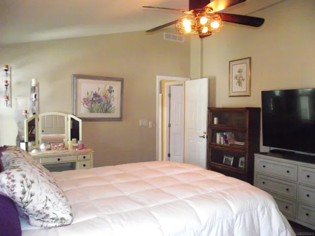 a view of a bathroom from a hallway
