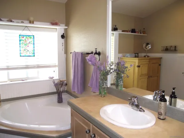 a living room with furniture and flat screen tv