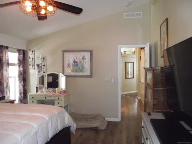 a view of a balcony with wooden floor