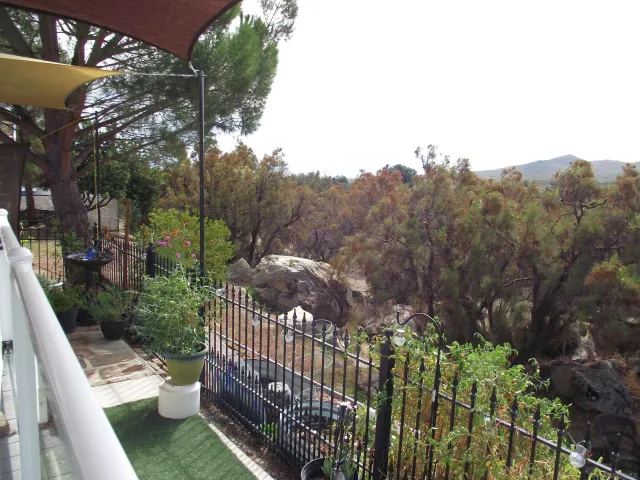 an aerial view of residential house with outdoor space and lake view