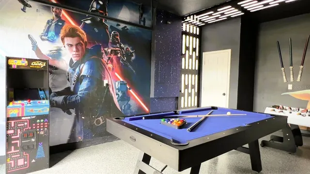 a bedroom with a bed and a lamp with the table