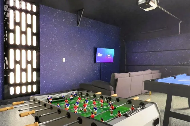 a bedroom with a bed and a cabinet