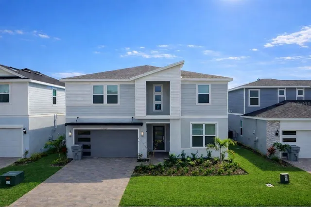 a room with a table and chairs