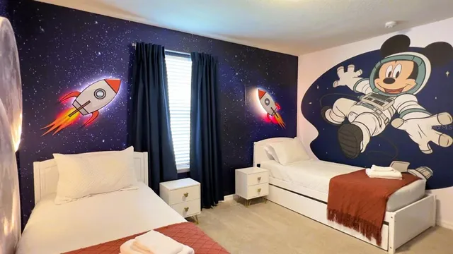 a view of a dining room with furniture and window