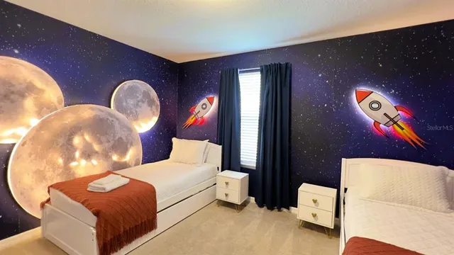 a view of a balcony with floor to ceiling windows and wooden fence