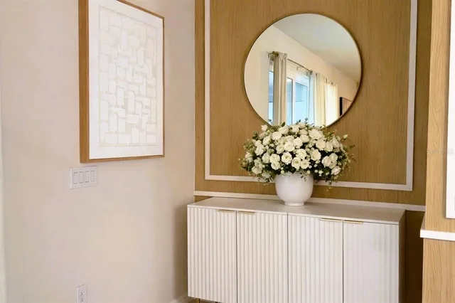 a bed room with furniture and a window