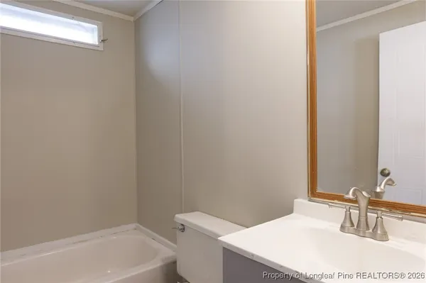 a bathroom with a sink and a bathtub