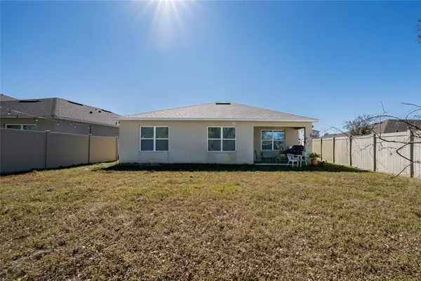 a house view with a garden space