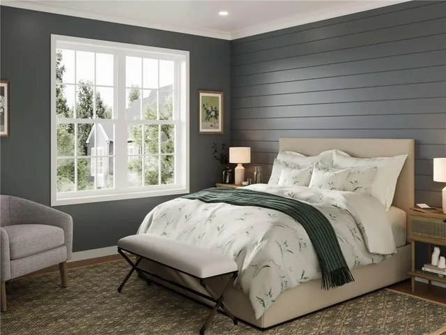 a view of a lake with a yard and a wooden floor