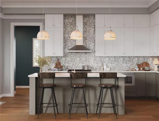 a kitchen with a table and chairs in it