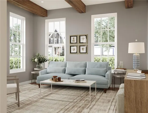 a living room with furniture and a window