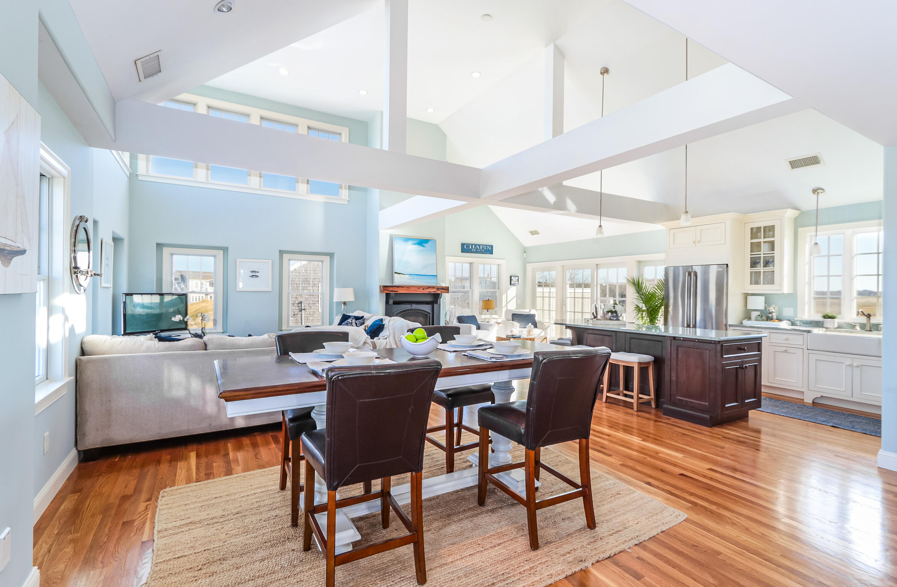 19 Dr Botero Road Dennis, MA 02638 - Photo 11 of 42 a view of a dining room with furniture and wooden floor