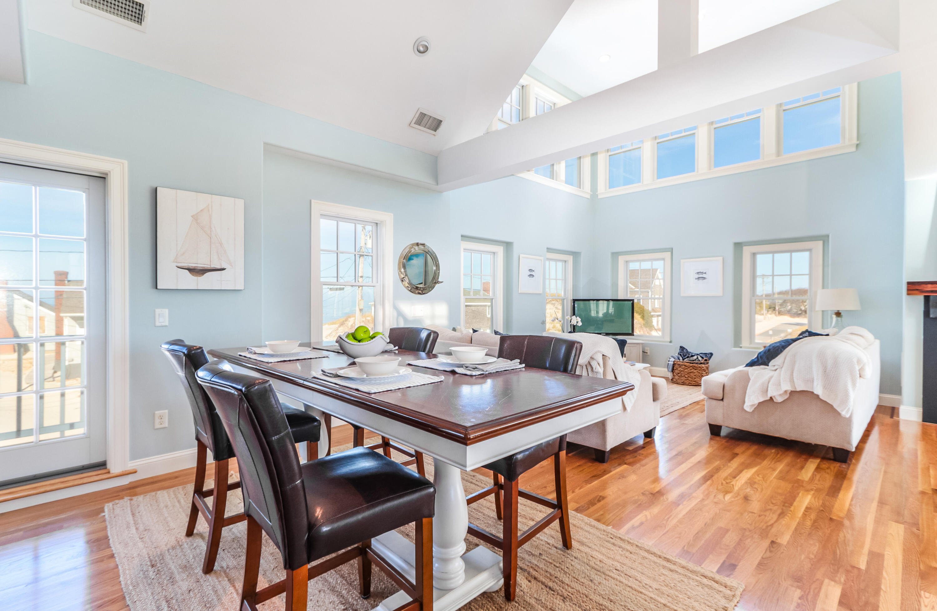 19 Dr Botero Road Dennis, MA 02638 - Photo 13 of 42 a view of a dining room with furniture and wooden floor