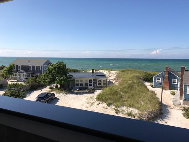 19 Dr Botero Road Dennis, MA 02638 - Photo 29 of 42 a view of a swimming pool with an ocean view