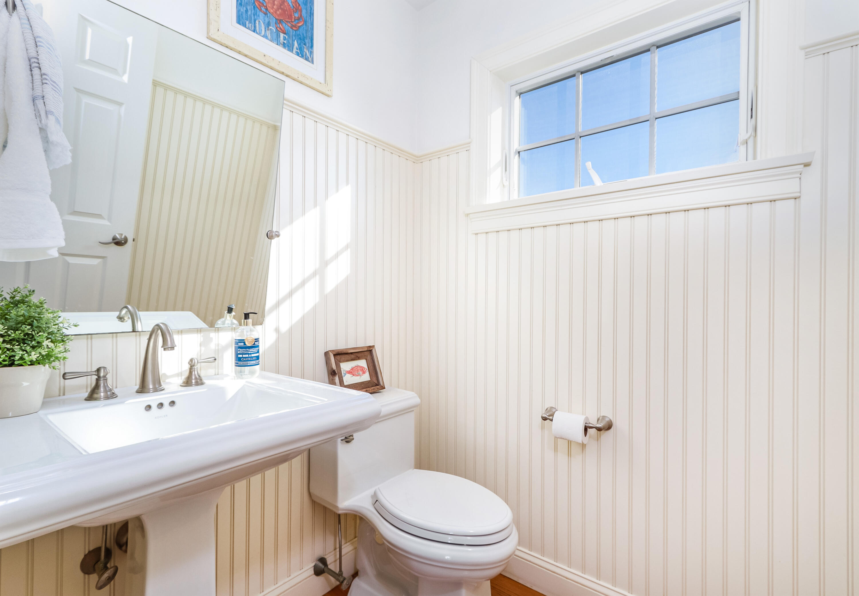 19 Dr Botero Road Dennis, MA 02638 - Photo 31 of 42 a bathroom with a sink a toilet and shower curtain