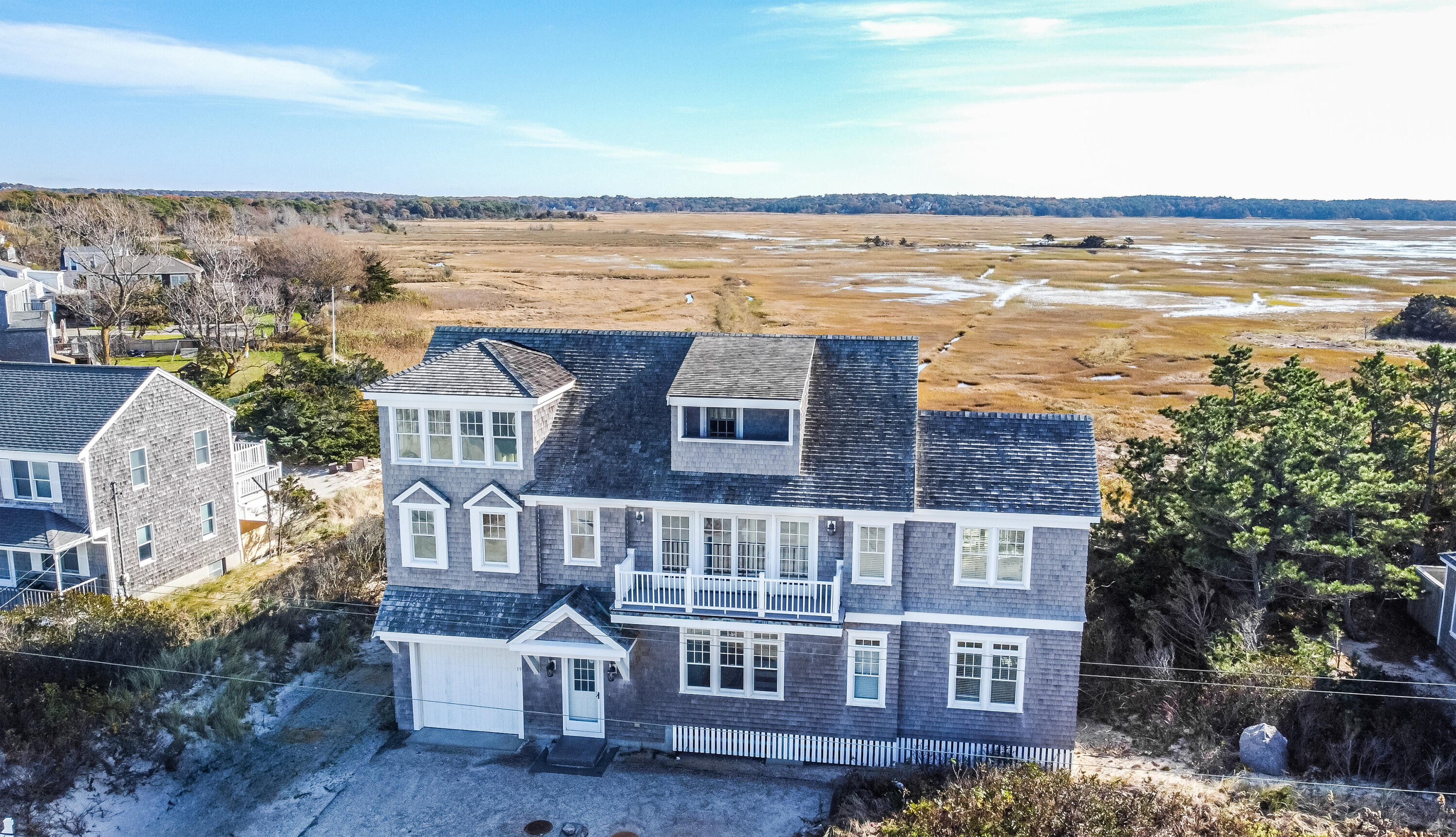 19 Dr Botero Road Dennis, MA 02638 - Photo 33 of 42 a front view of a house with a ocean view