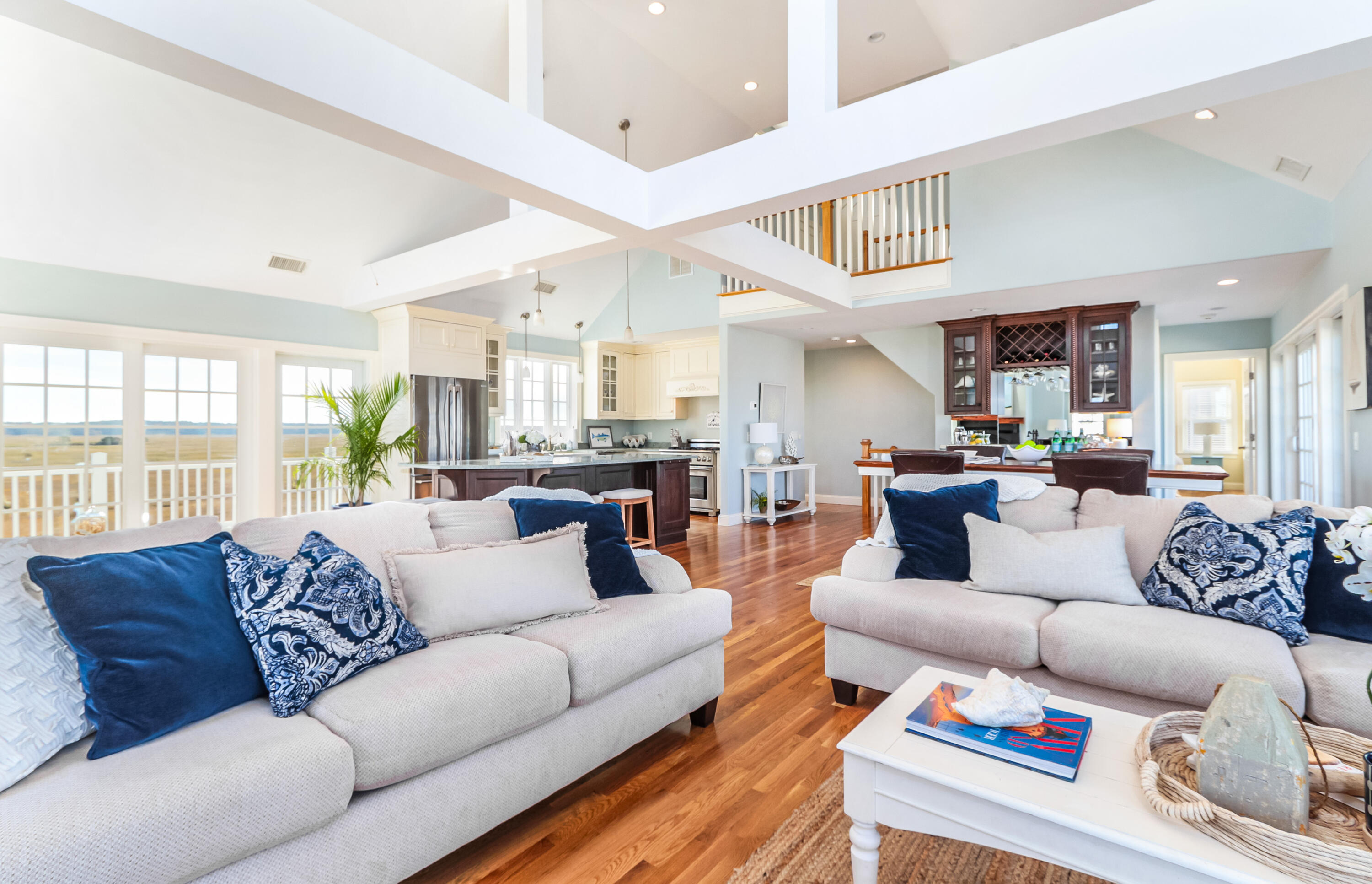 19 Dr Botero Road Dennis, MA 02638 - Photo 10 of 42 a living room with furniture and a large window