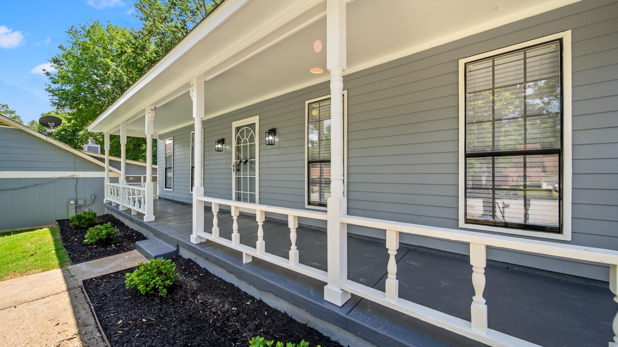 4351 Spring Oak Cove Memphis, TN 38125 - Photo 3 of 40 a view of a house with a window and wooden fence