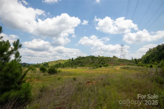 a view of mountain with lake view