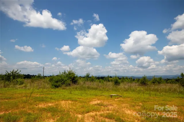 a view of a lake in middle of a city