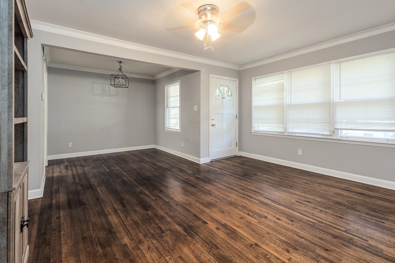 4606 Helene Road Memphis, TN 38117 - Photo 2 of 10 wooden floor in an empty room with a window