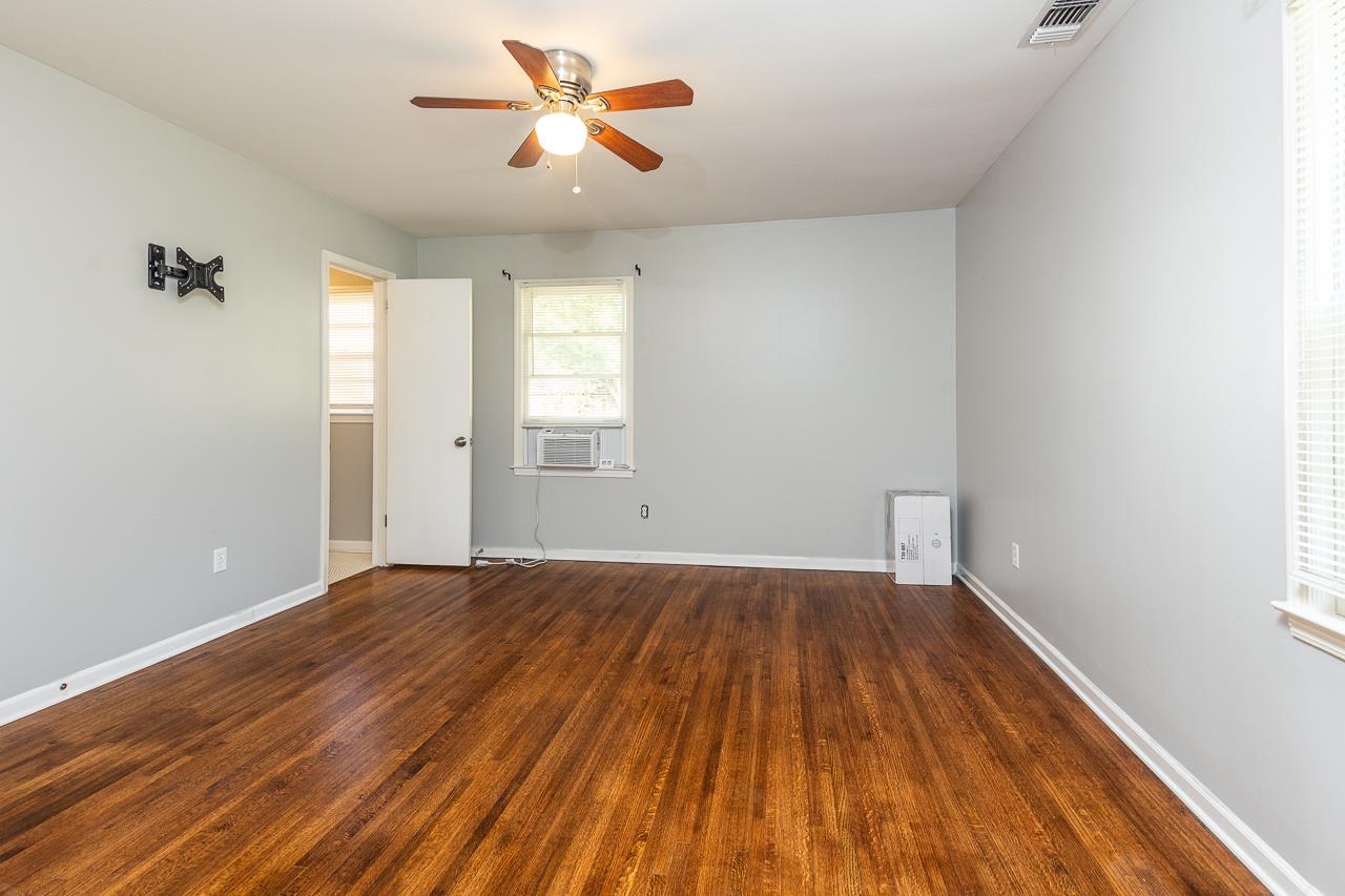 4606 Helene Road Memphis, TN 38117 - Photo 10 of 10 wooden floor in an empty room with a window