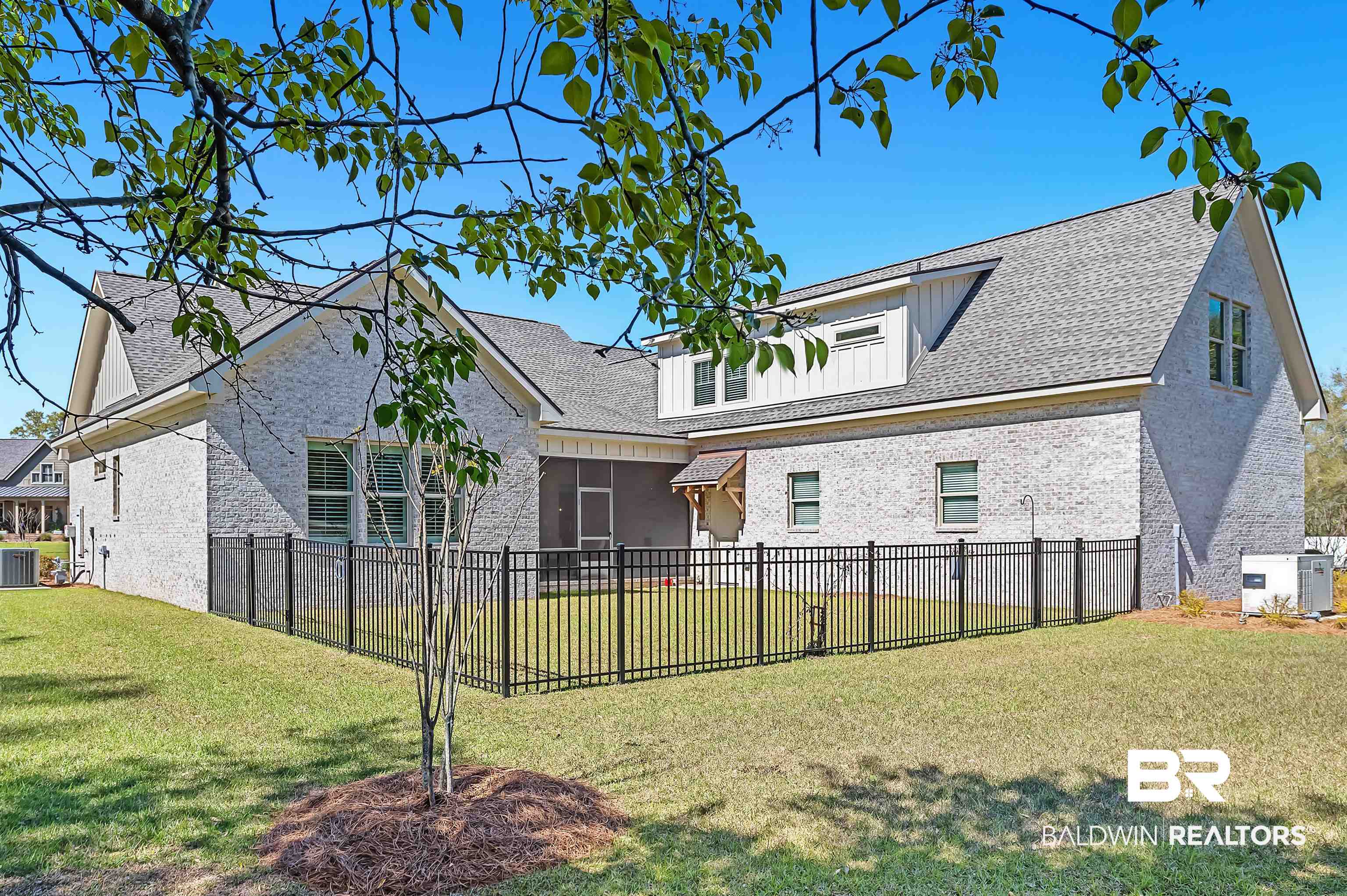 9144 Harvest Ridge Fairhope, AL 36532 - Photo 14 of 58 Rear view of property with brick siding, cooling unit, fence private yard, and a yard