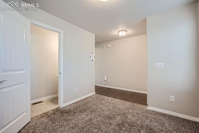 6126 Jorie Road Colorado Springs, CO 80927 - Photo 17 of 28 Spare room with carpet floors