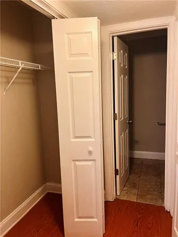 a bathroom with a granite countertop