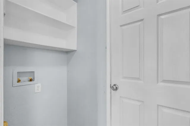 a kitchen with a stove oven and sink