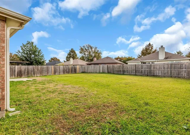 a view of outdoor space and yard