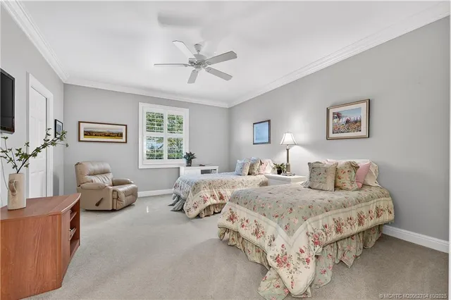 a bathroom with a granite countertop toilet sink and mirror