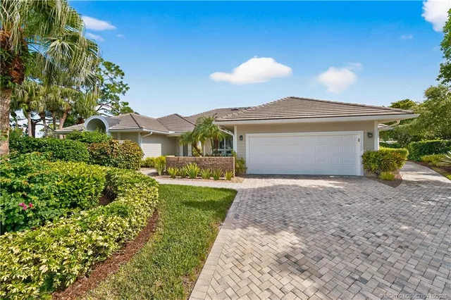 a view of a back yard of the house