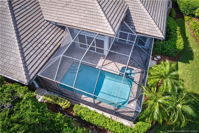 a view of a houses with a swimming pool