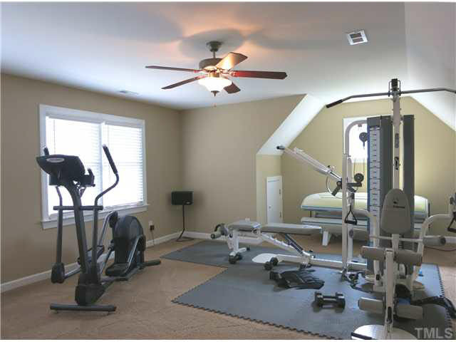 1627 Weatherford Circle Raleigh, NC 27604 - Photo 21 of 25 Spacious Bedroom 4/Bonus Rm offers neutral carpet, CF, lots of windows & lg closet. Bonus Room