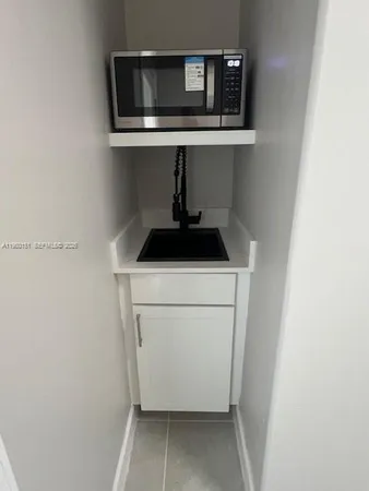 a utility room with a sink