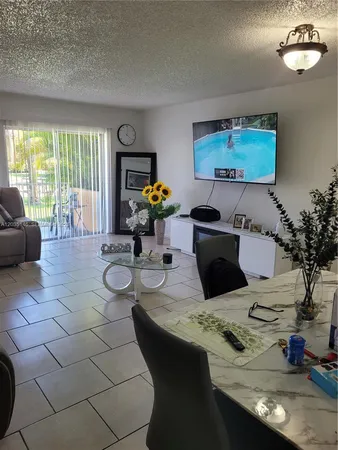 $160,000 | 18101 Northwest 68th Avenue, Unit E105, Hialeah, FL 33015